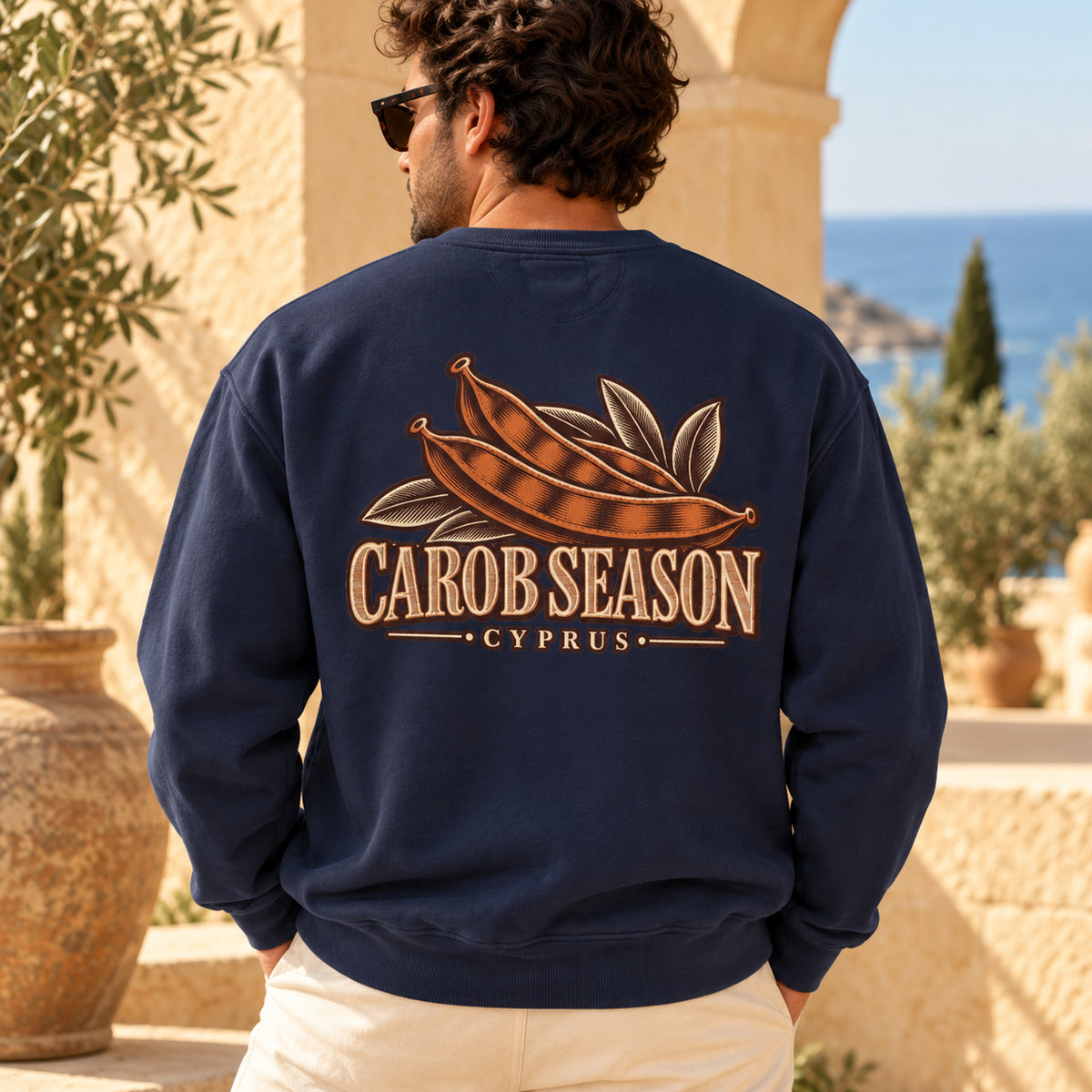 TP HERO: Carob Season Cyprus Harvest True Navy back-print sweatshirt on approved male model