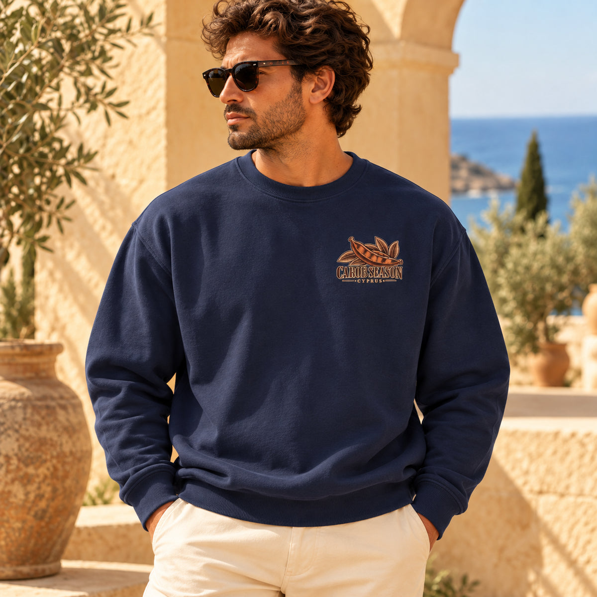 Carob Season Cyprus Harvest True Navy sweatshirt front chest print on approved male model
