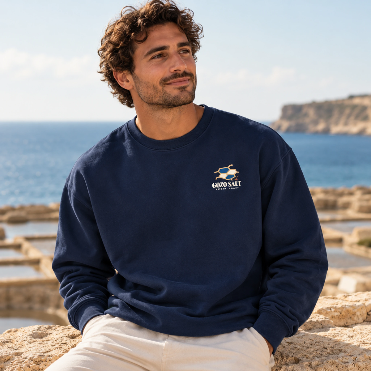 Front lifestyle view of the Gozo Salt Season Comfort Colors sweatshirt in True Navy with the small GOZO SALT chest design.