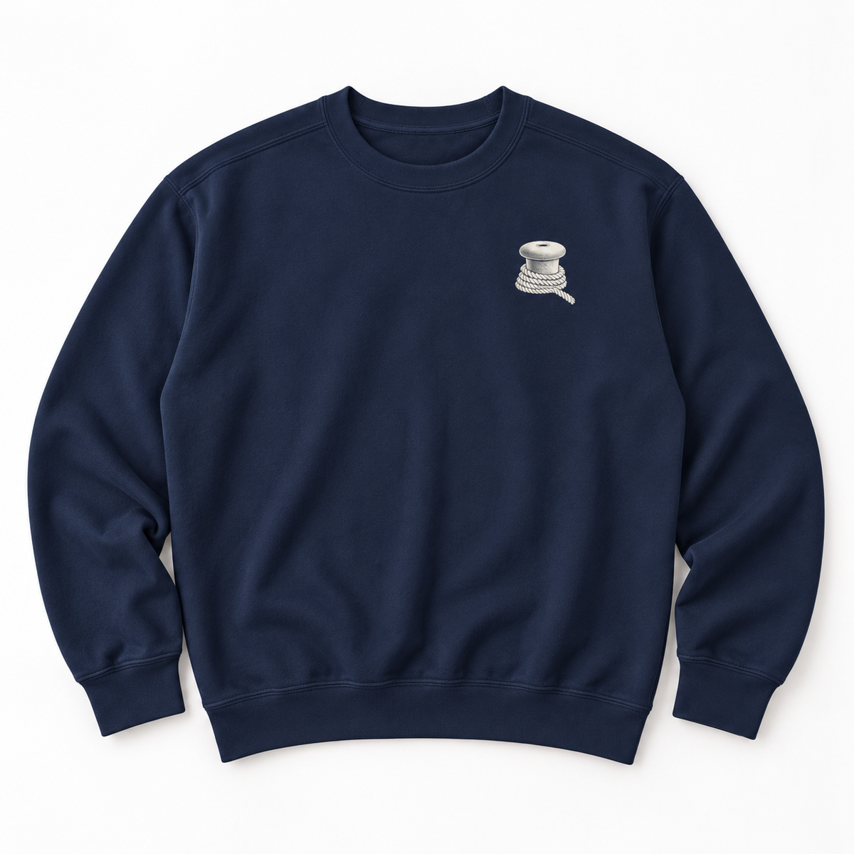 Close-up of the Last Ferry Home bollard and rope chest print on a True Navy garment-dyed sweatshirt.