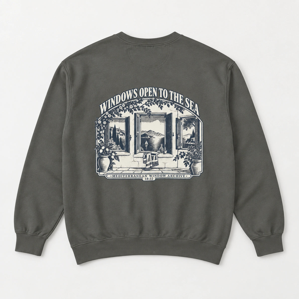 Windows Open to the Sea Pepper Comfort Colors 1566 sweatshirt back flat lay with full Mediterranean window artwork.