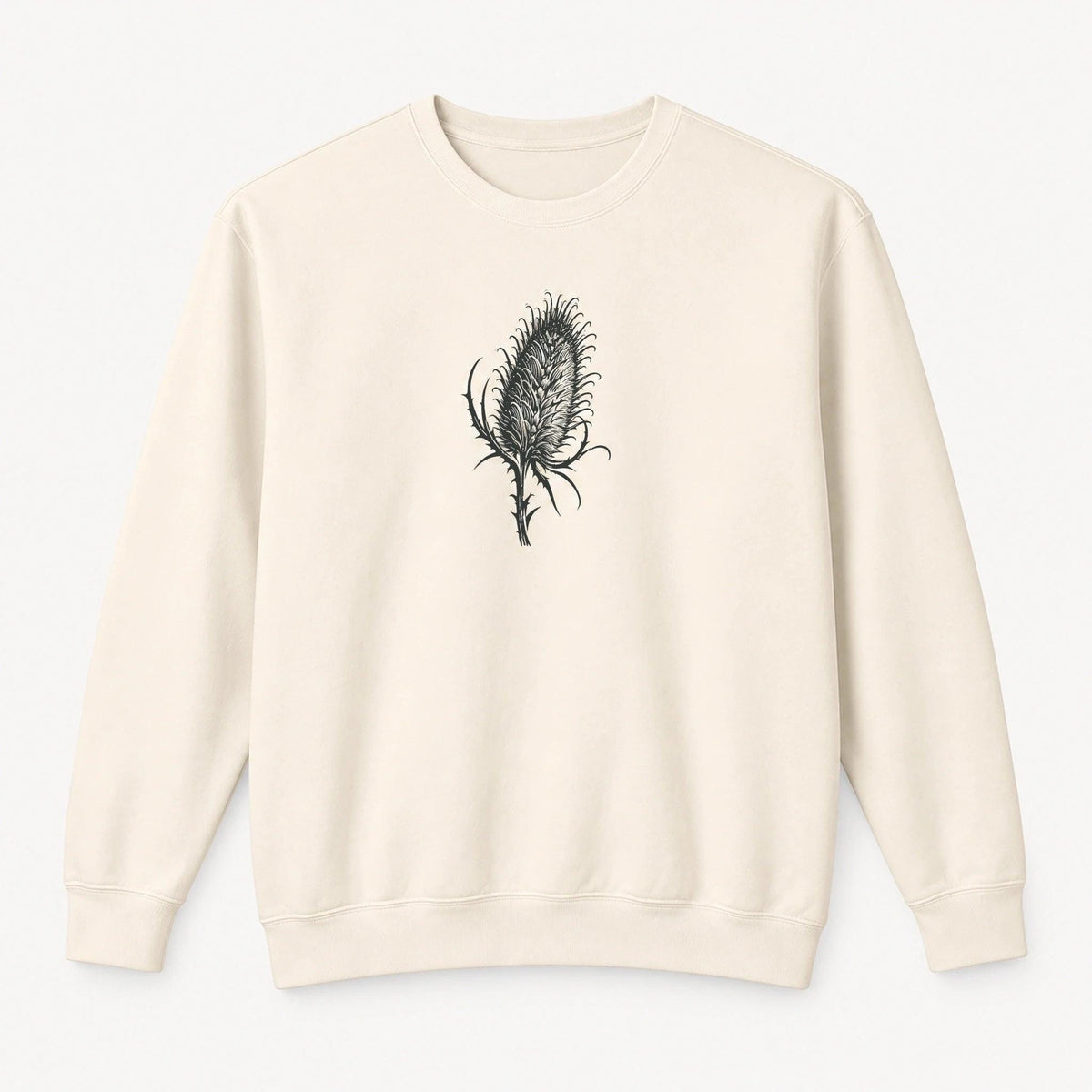 Cardó Ivory Comfort Colors 1466 crewneck front with original charcoal botanical artwork
