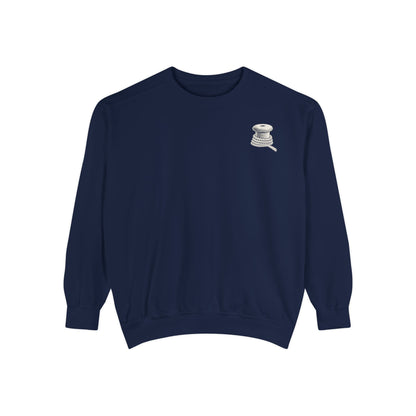 True Navy Comfort Colors 1566 sweatshirt flat lay showing the Last Ferry Home chest mark.