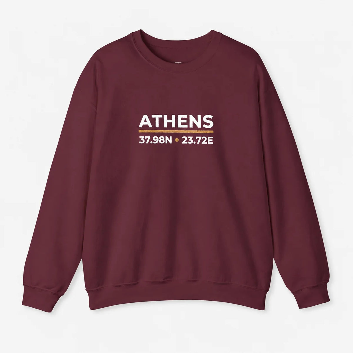 A crewneck sweatshirt in maroon with a graphic on the chest reading 'ATHENS 37.98N .