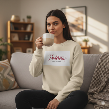 Woman sitting on a couch holding a mug with a 'Poderosa' sweatshirt.