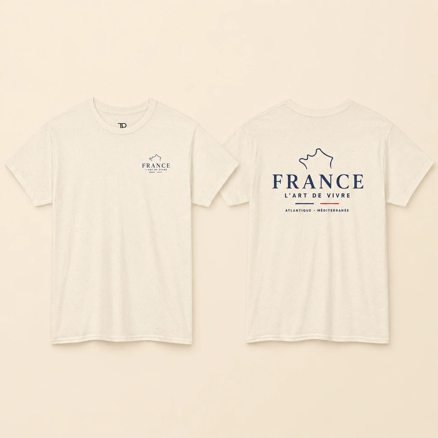 Two views of an off-white short-sleeve t-shirt on a light beige background. The front view shows a small navy blue graphic on the left chest with the word 'FRANCE' and a mountain outline.