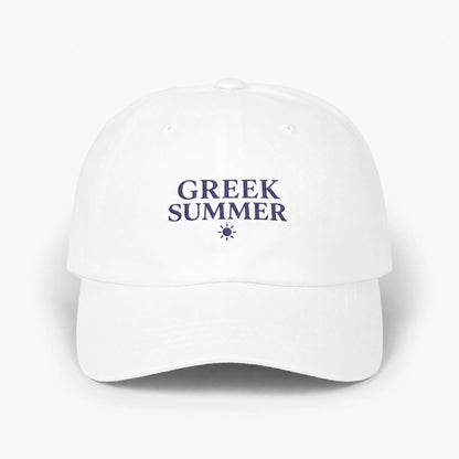 A white baseball cap with 'GREEK SUMMER' embroidered in navy blue text and a small sun icon on the front, set against a plain white background.