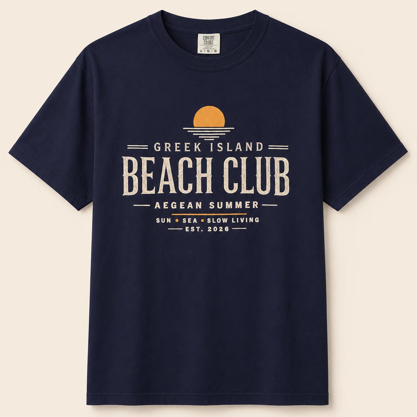 Navy blue t-shirt with 'Greek Island Beach Club' text and graphic on a beige background