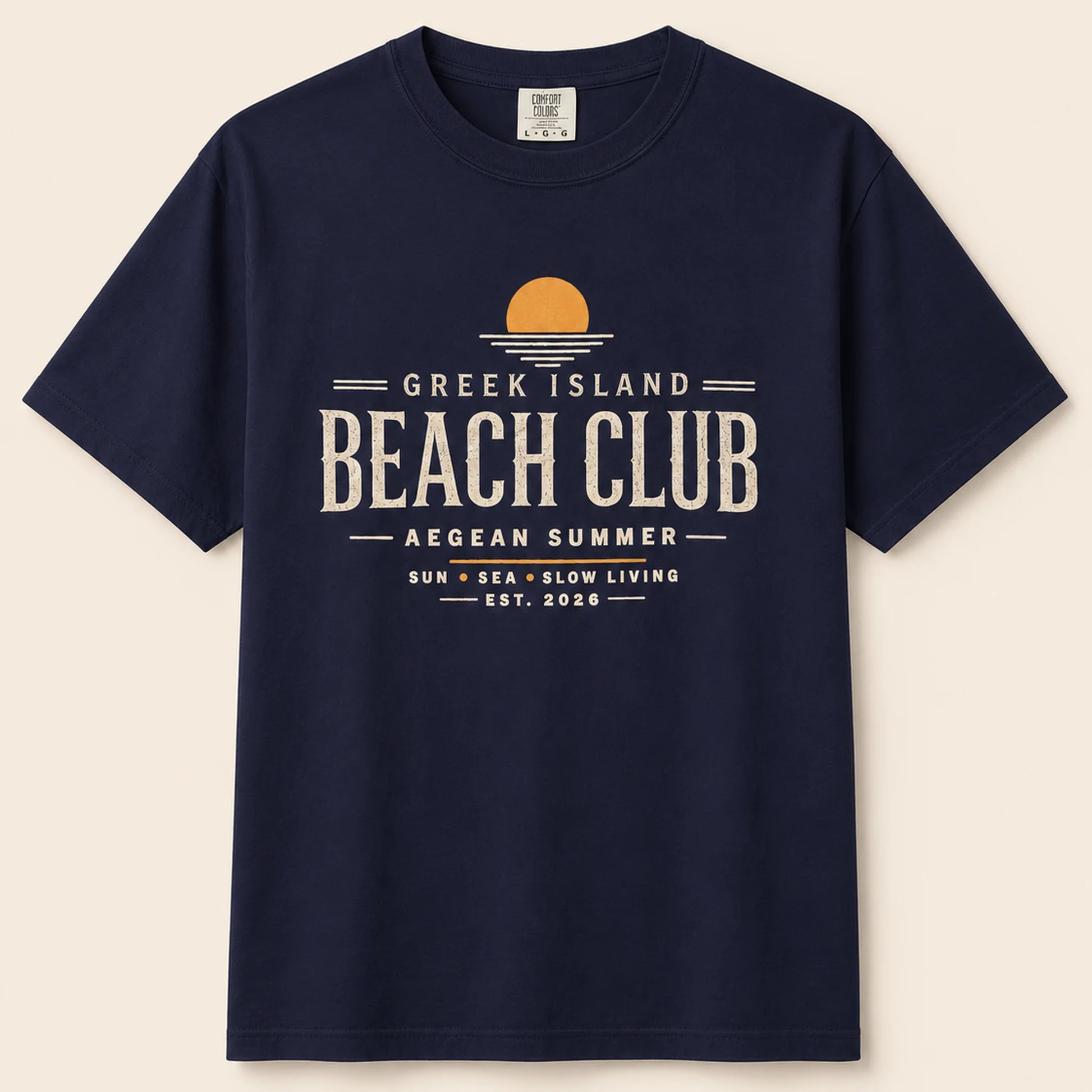 Navy blue t-shirt with 'Greek Island Beach Club' text and graphic on a beige background