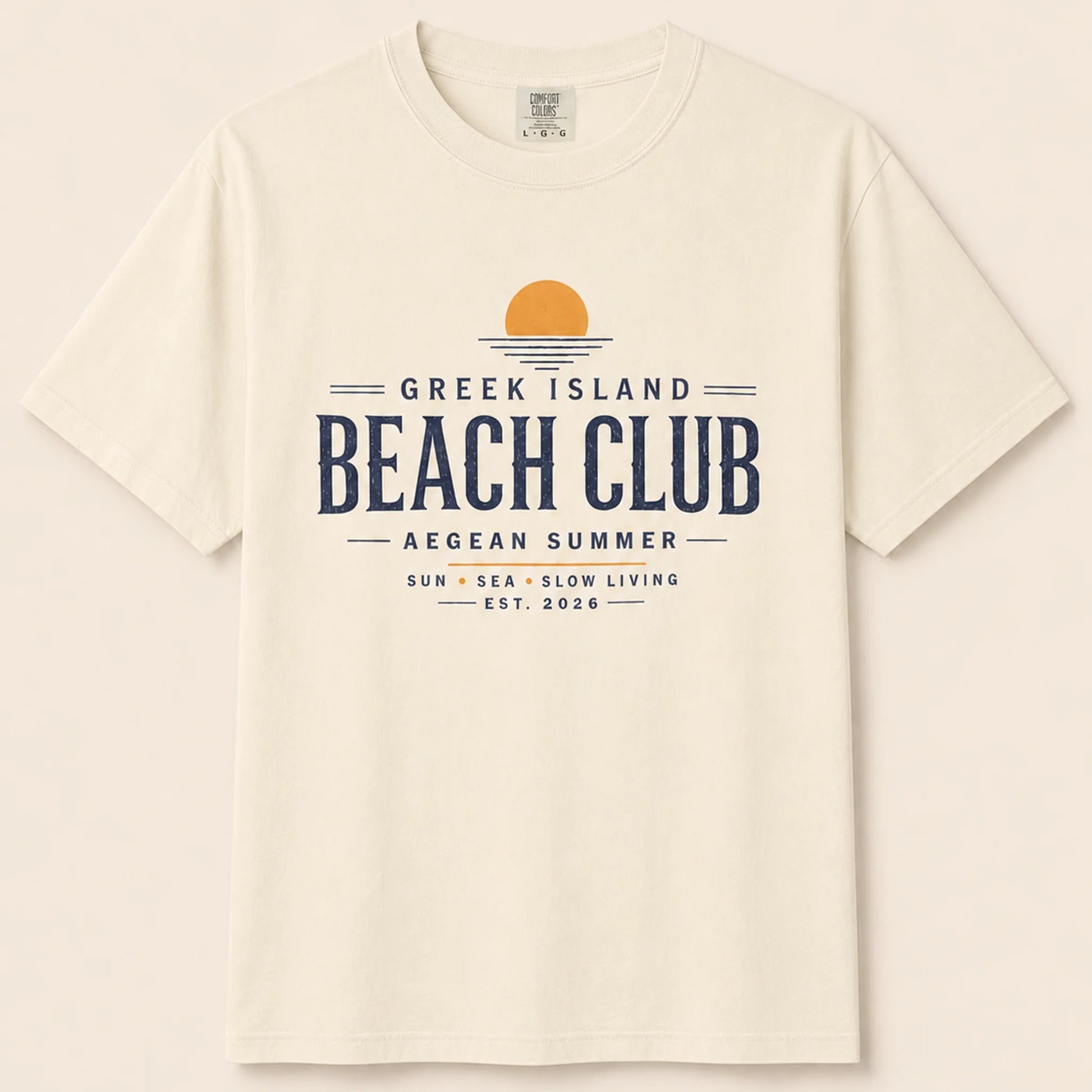 Beige t-shirt with 'Greek Island Beach Club' text design on a beige background