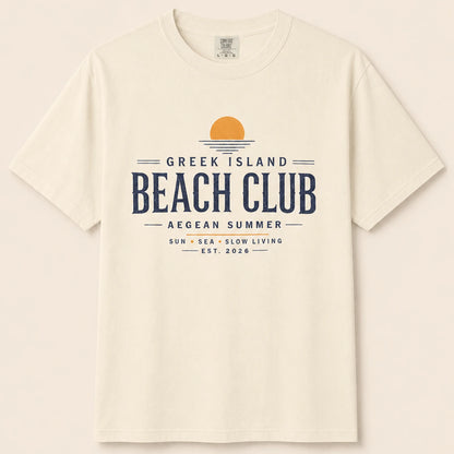 Beige t-shirt with 'Greek Island Beach Club' text design on a beige background