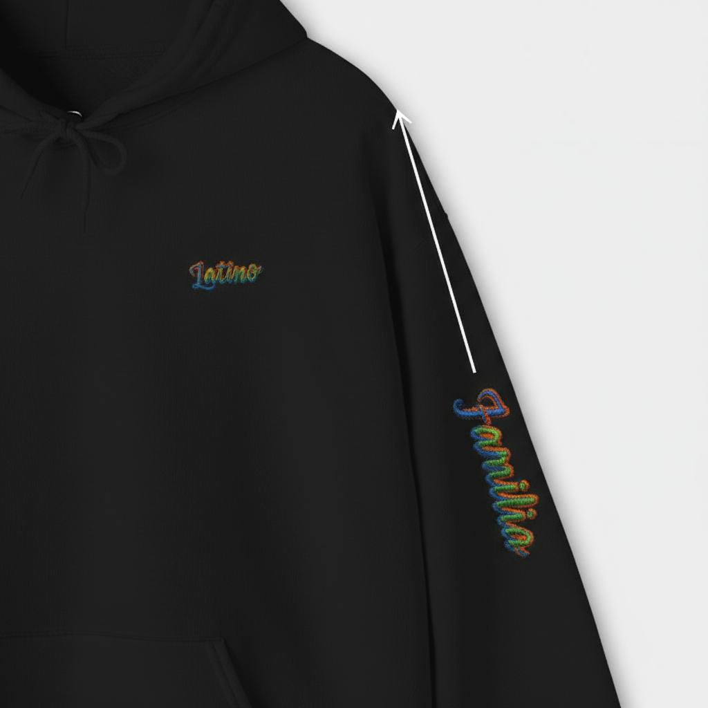 Black hoodie with 'Latino' and 'Familia' text embroidery on a white background