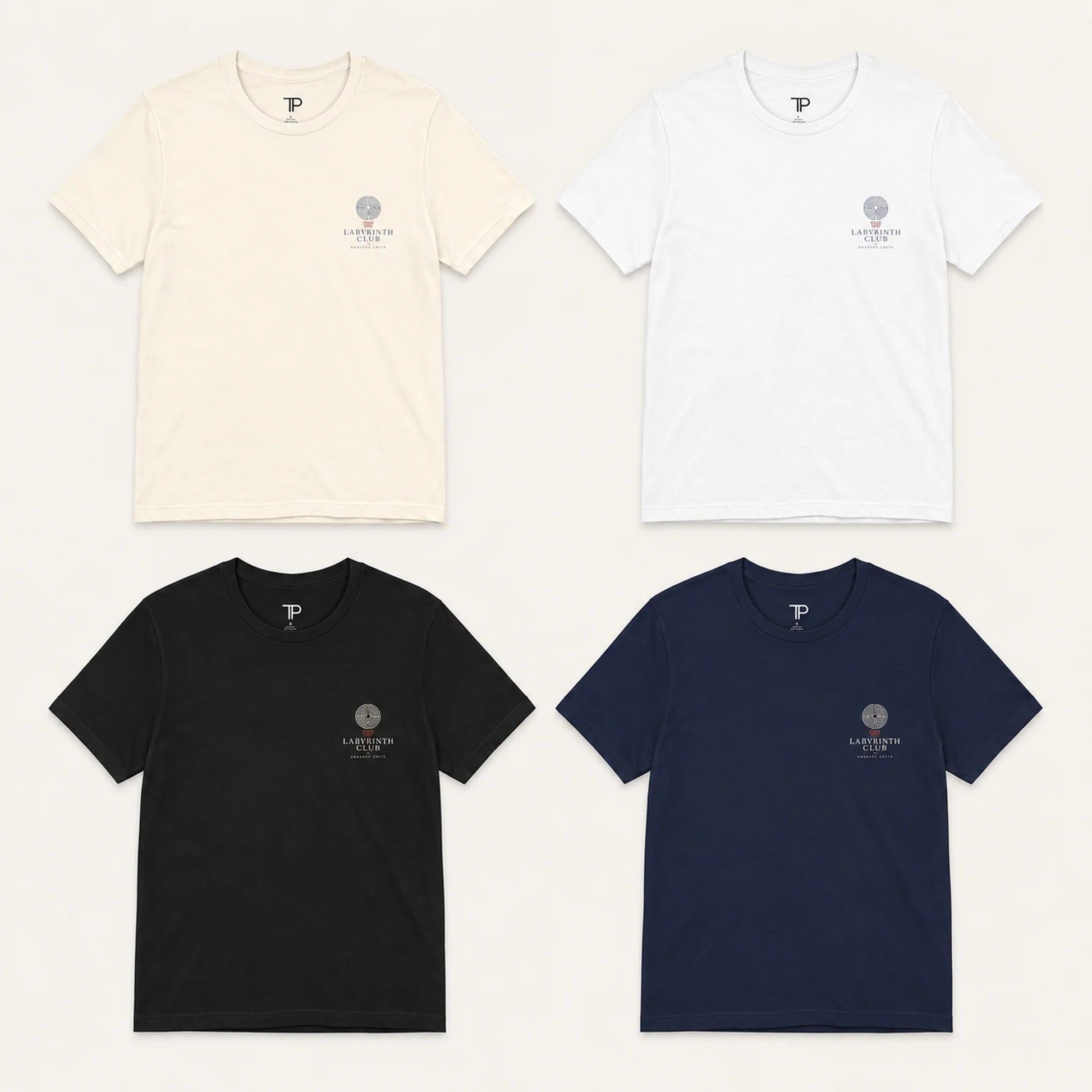 Four t-shirts in beige, white, black, and navy with a logo on a white background