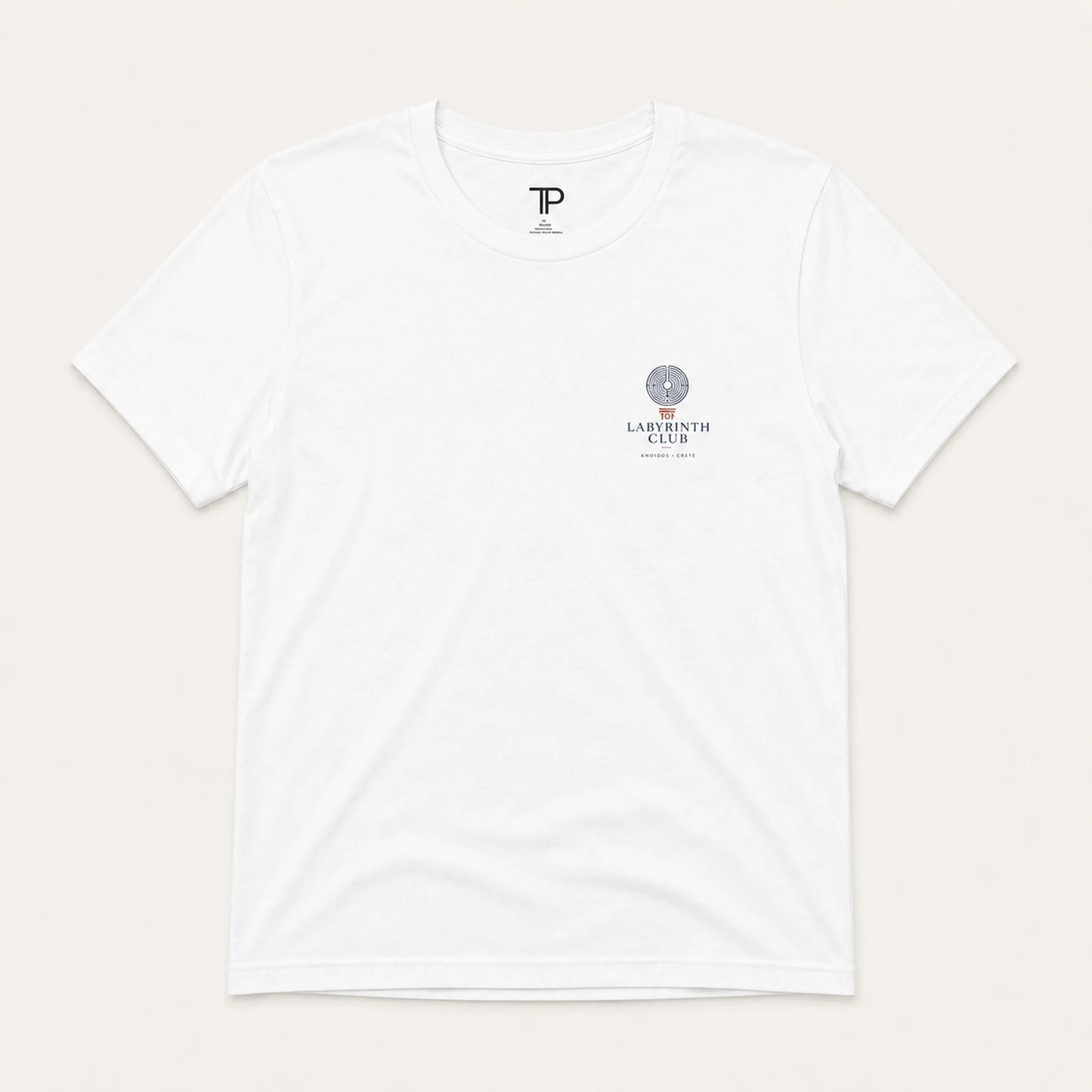 White t-shirt with logos on a light beige background