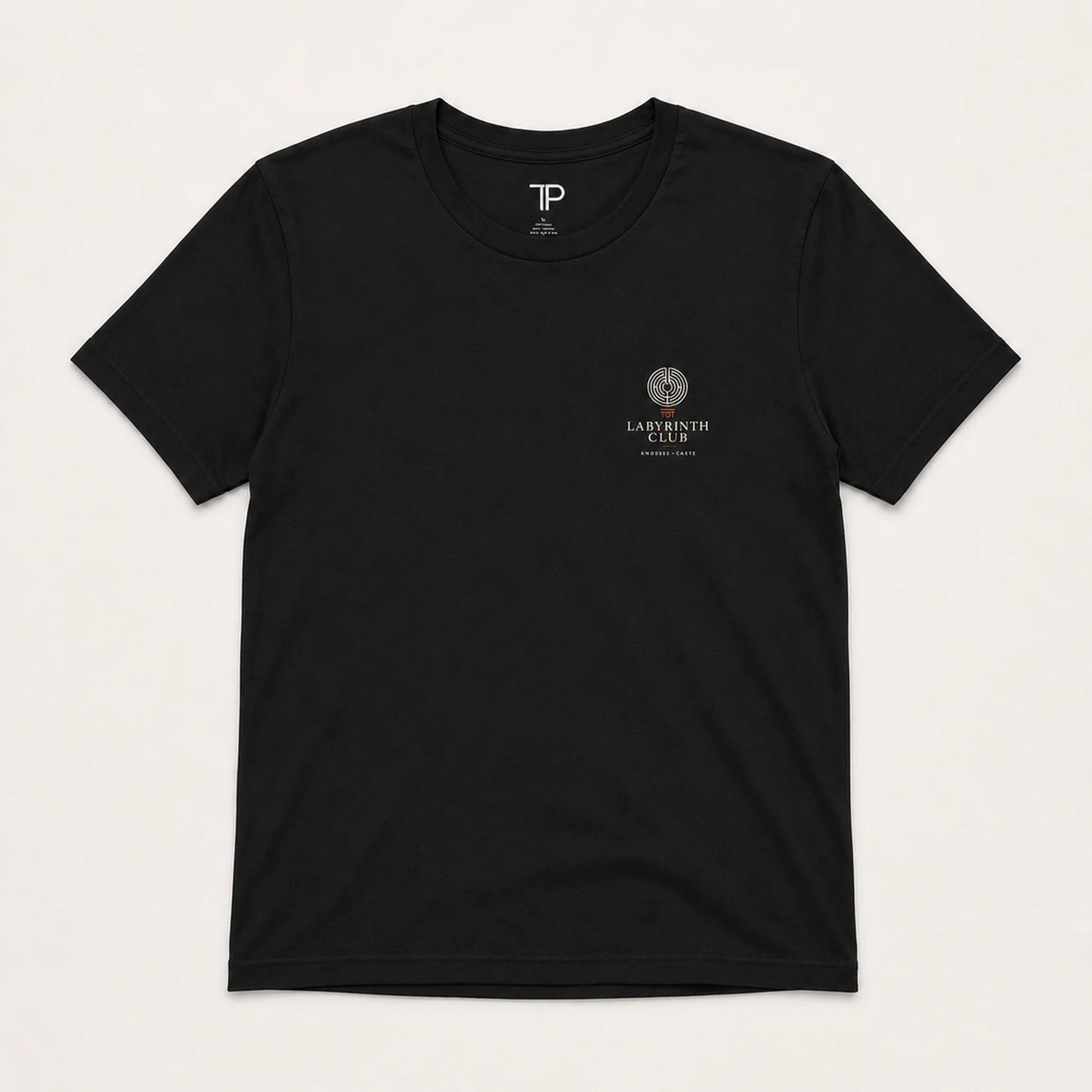 Black t-shirt with a logo on the chest against a white background