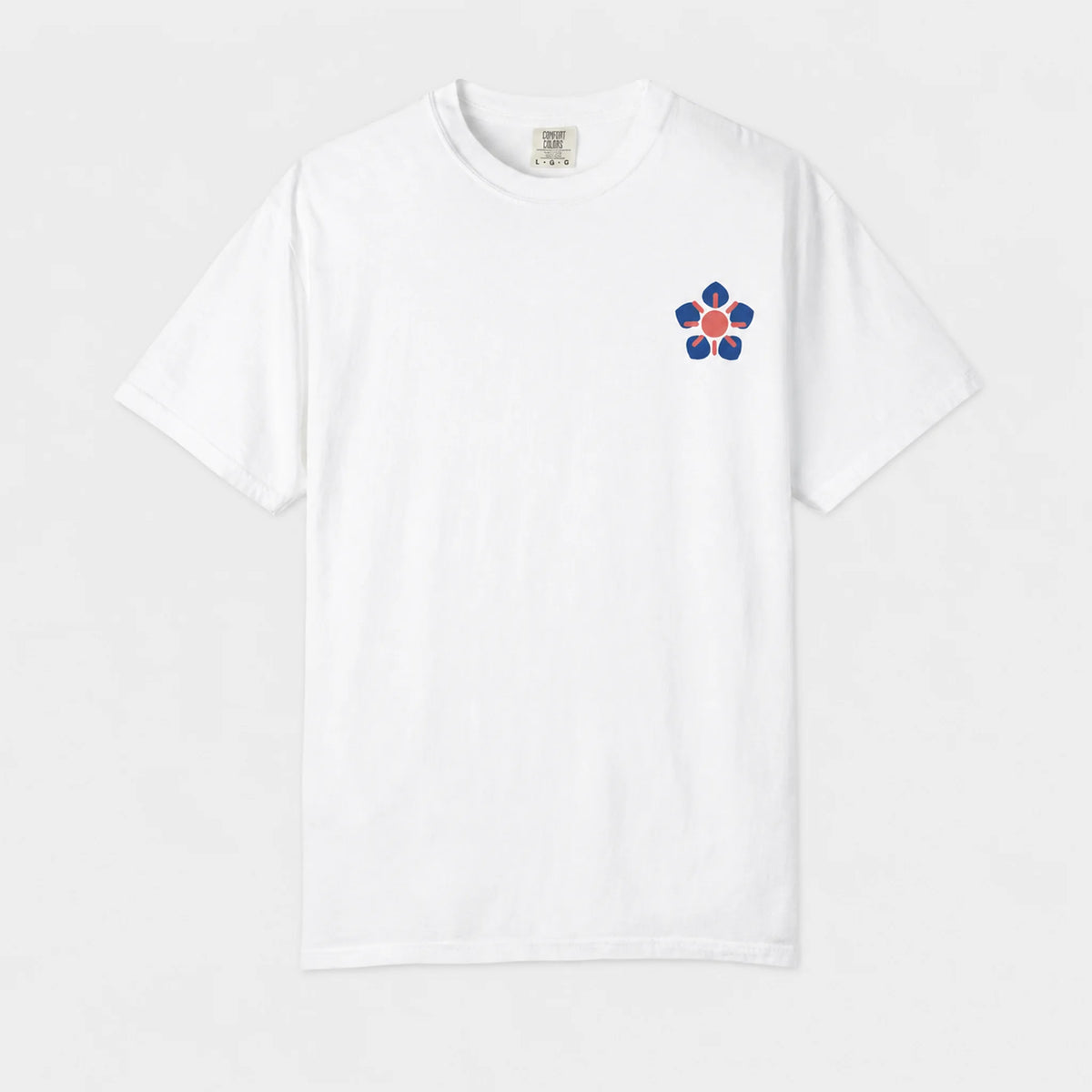 A white short-sleeve crewneck t-shirt featuring a small embroidered flower graphic on the left chest with blue petals, a red center, and yellow accents, displayed against a clean white background.