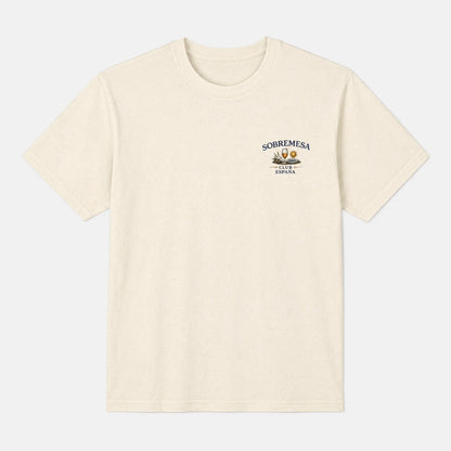 An off-white short-sleeve crewneck t-shirt with a small graphic on the left chest featuring the text 'SOBREMESA' and 'Tulum, Mexico' with a small illustration.