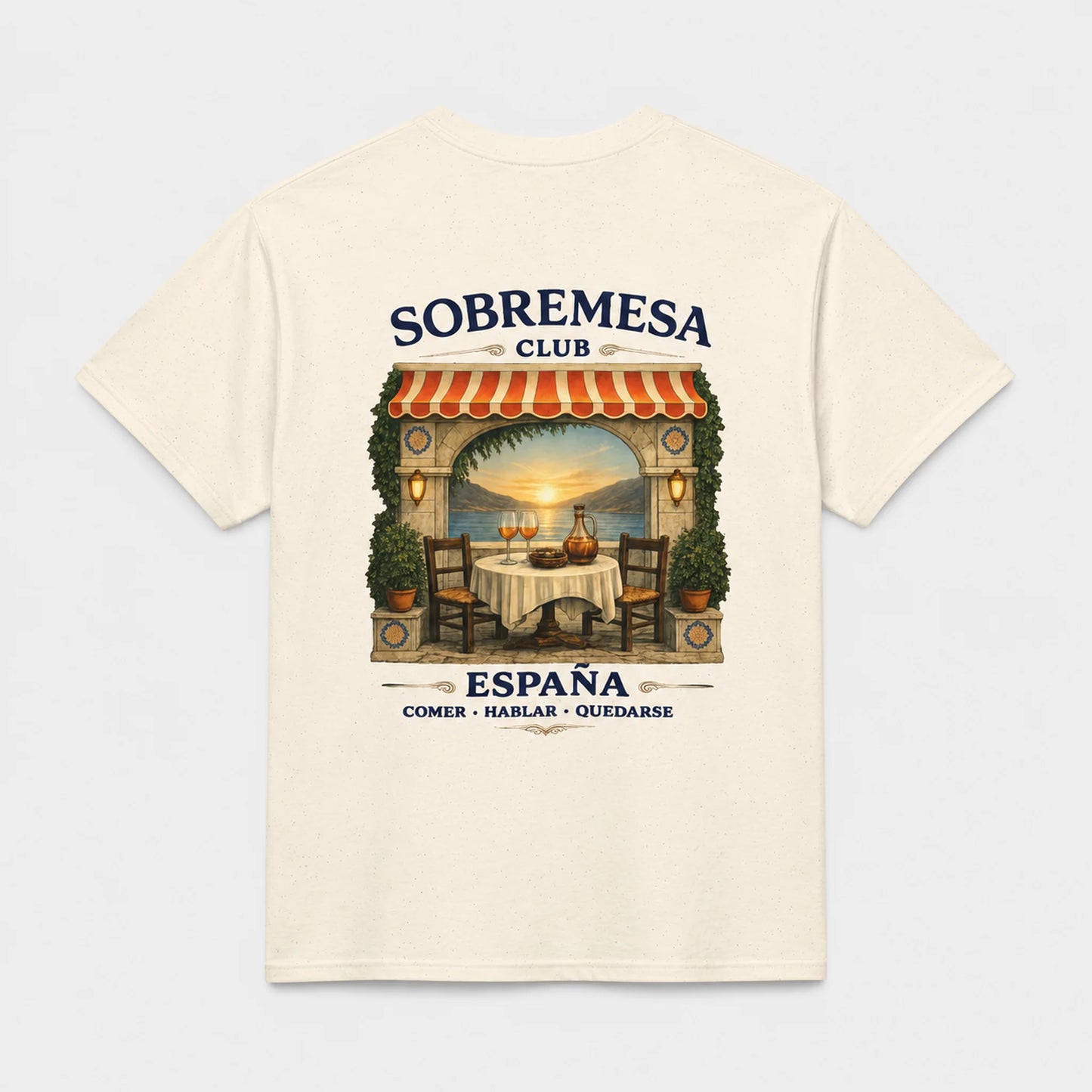 An off-white short-sleeve t-shirt with a large graphic print on the back, featuring a retro-style restaurant scene with the text 'SOBREMESA CLUB' and 'ESPAÑA COMER - HABLAR - OUIDARSE'.