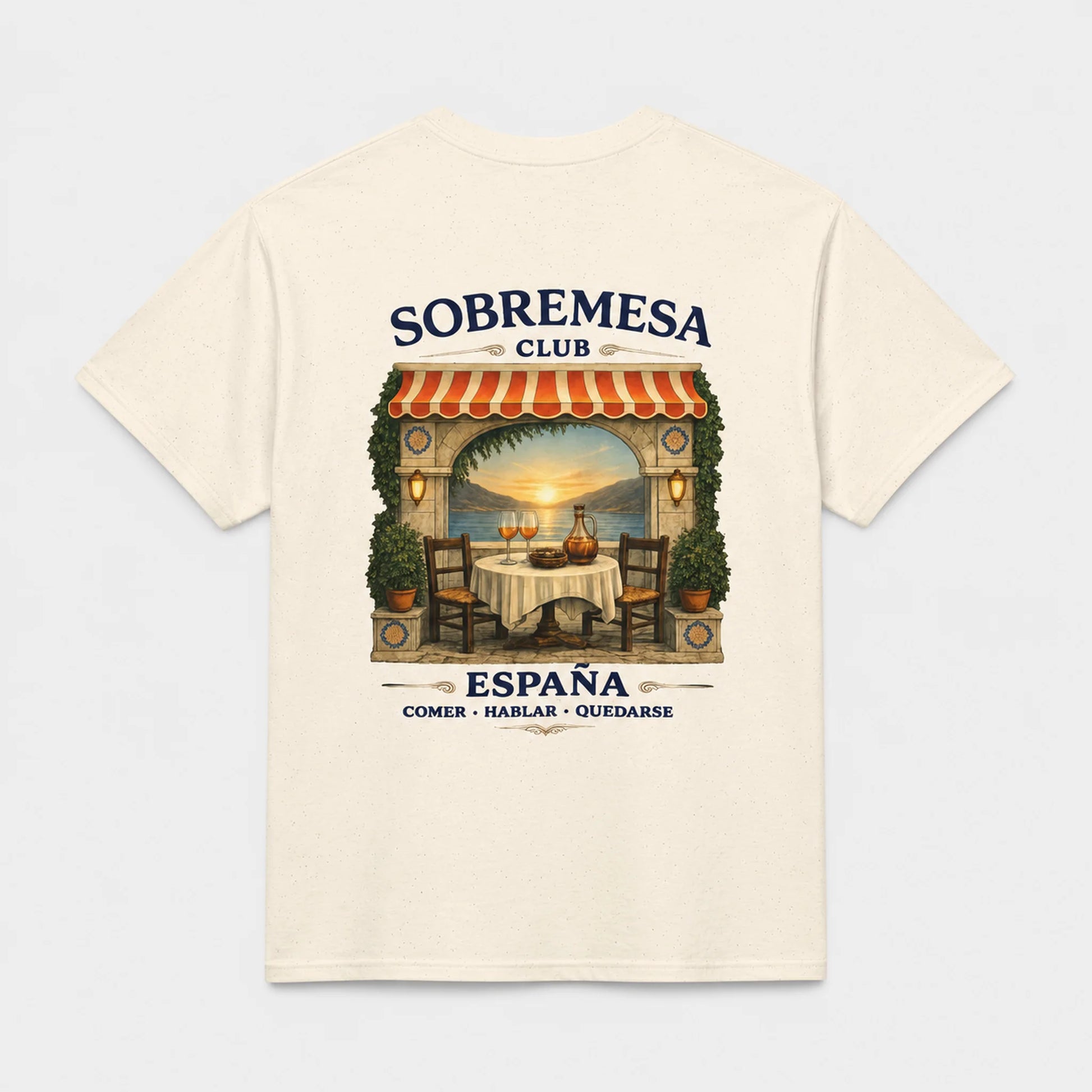 An off-white short-sleeve t-shirt with a large graphic print on the back, featuring a retro-style restaurant scene with the text 'SOBREMESA CLUB' and 'ESPAÑA COMER - HABLAR - OUIDARSE'.
