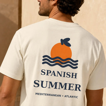 TP HERO: A man wearing a cream-colored t-shirt, viewed from the back. The shirt features a graphic of an orange and blue waves with the text 'SPANISH SUMMER' and 'MEDITERRANEAN • ATLANTIC'.