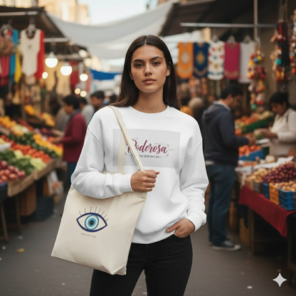 Woman holding a tote bag with an eye design at a market