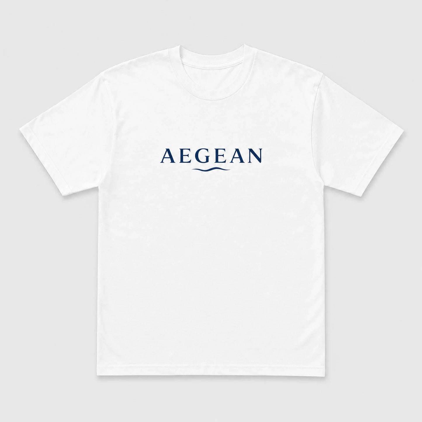A white short-sleeve crewneck t-shirt with the word 'AEGEAN' printed in navy blue across the chest, accompanied by a small wave graphic underneath, shown on a light gray background.