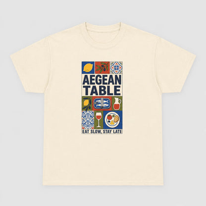 Beige t-shirt with 'Aegean Table' graphic design on a light gray background