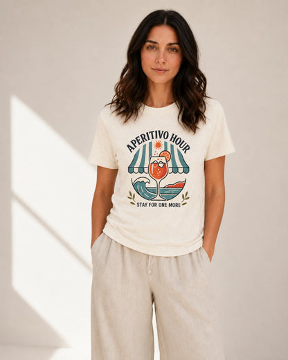 Woman wearing a white t-shirt with a graphic design and text on a plain background