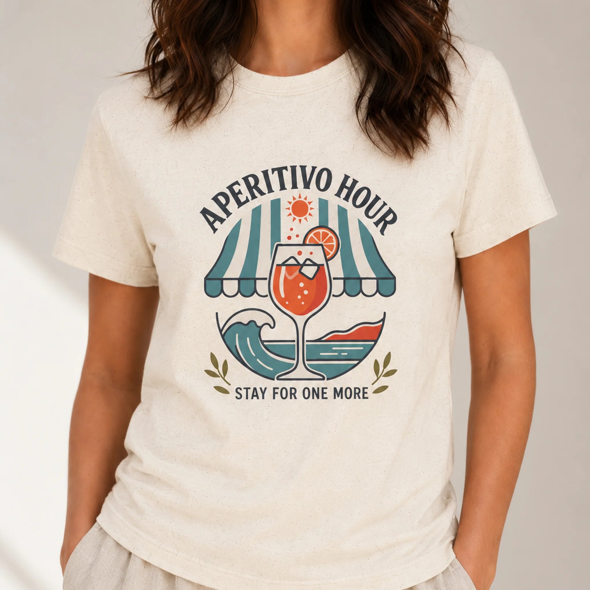 TP HERO: Person wearing a white t-shirt with 'Aperitivo Hour' graphic design.