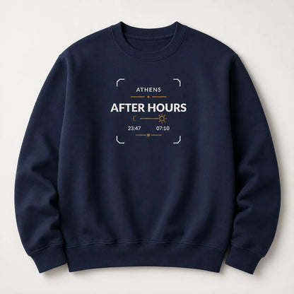 A navy blue crewneck sweatshirt with a embroidered design on the front reading 'ATHENS AFTER HOURS' and showing stylized time details, displayed against a light beige background.