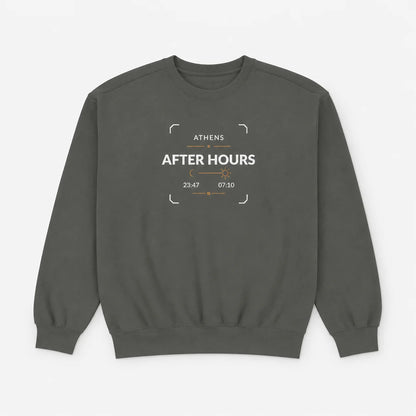 Pepper garment-dyed crewneck sweatshirt shown in a flat lay on a light background, featuring the Athens After Hours chest embroidery.