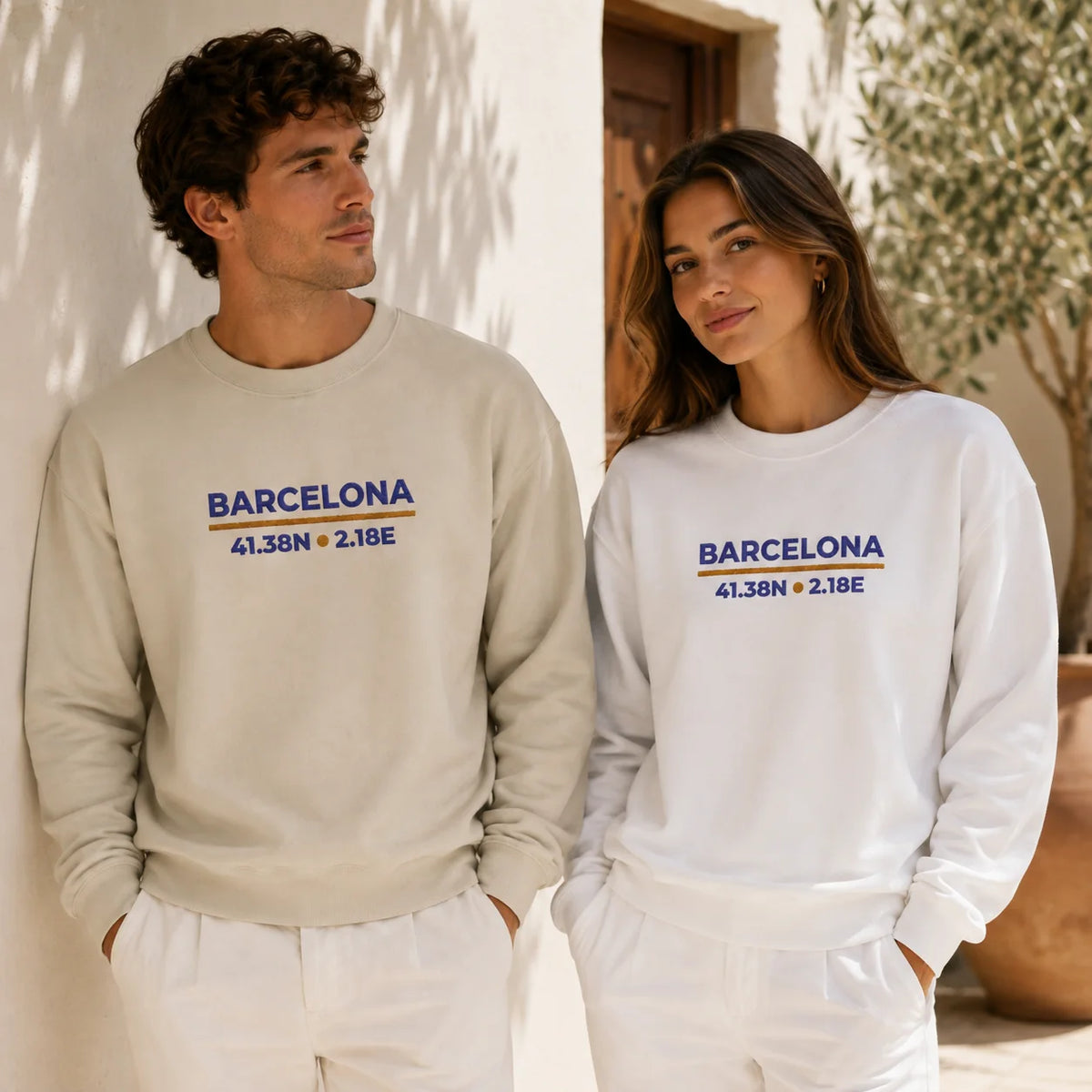 Female model wearing the Barcelona Coordinates Embroidered Sweatshirt, showing the embroidered front design.
