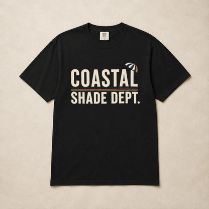 Black Coastal Shade Dept graphic T-shirt laid flat with cream lettering and retro stripe detail