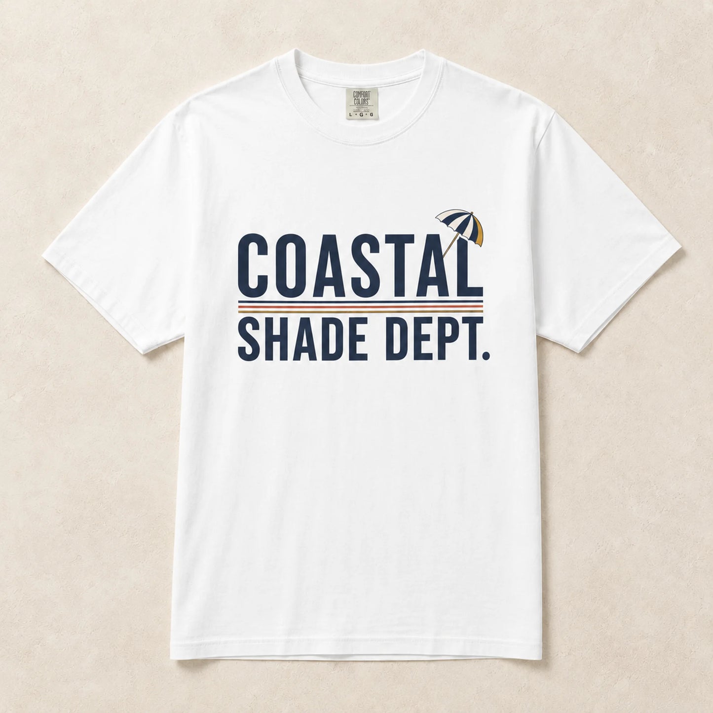 White Coastal Shade Dept graphic T-shirt laid flat with retro coastal typography design