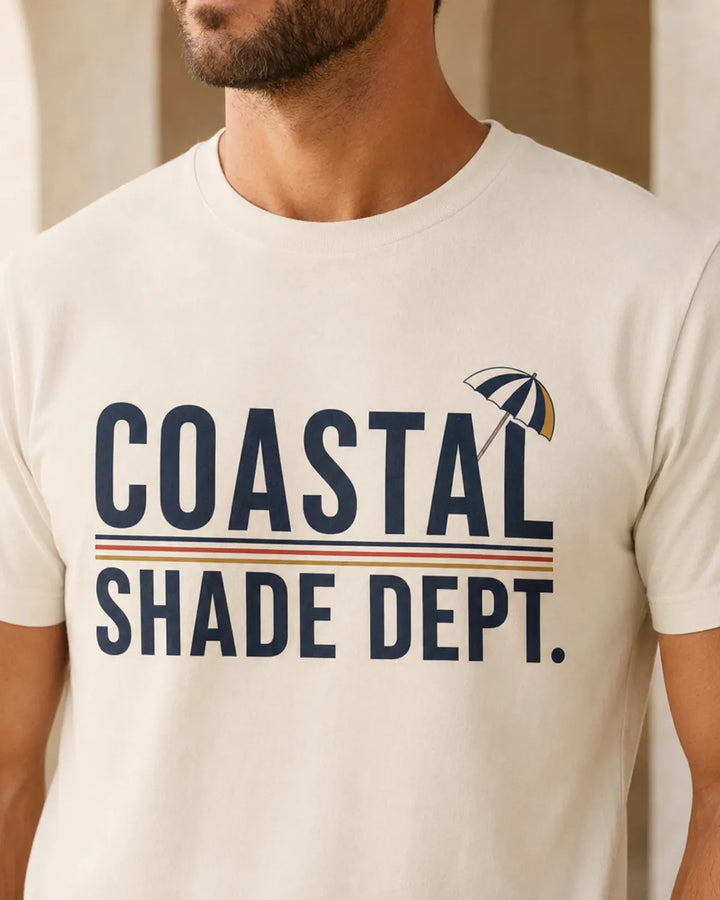 Coastal Shade Dept graphic T-shirt in ivory cream with retro beach umbrella design