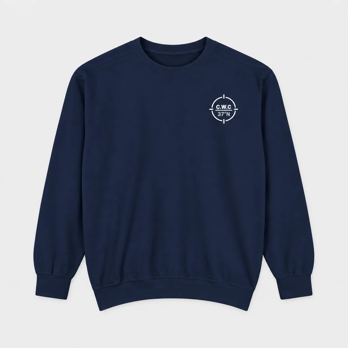 True Navy Cyclades Walking Club Comfort Colors 1566 sweatshirt flat lay with the small circular C.W.C. 37 degrees N left-chest mark.