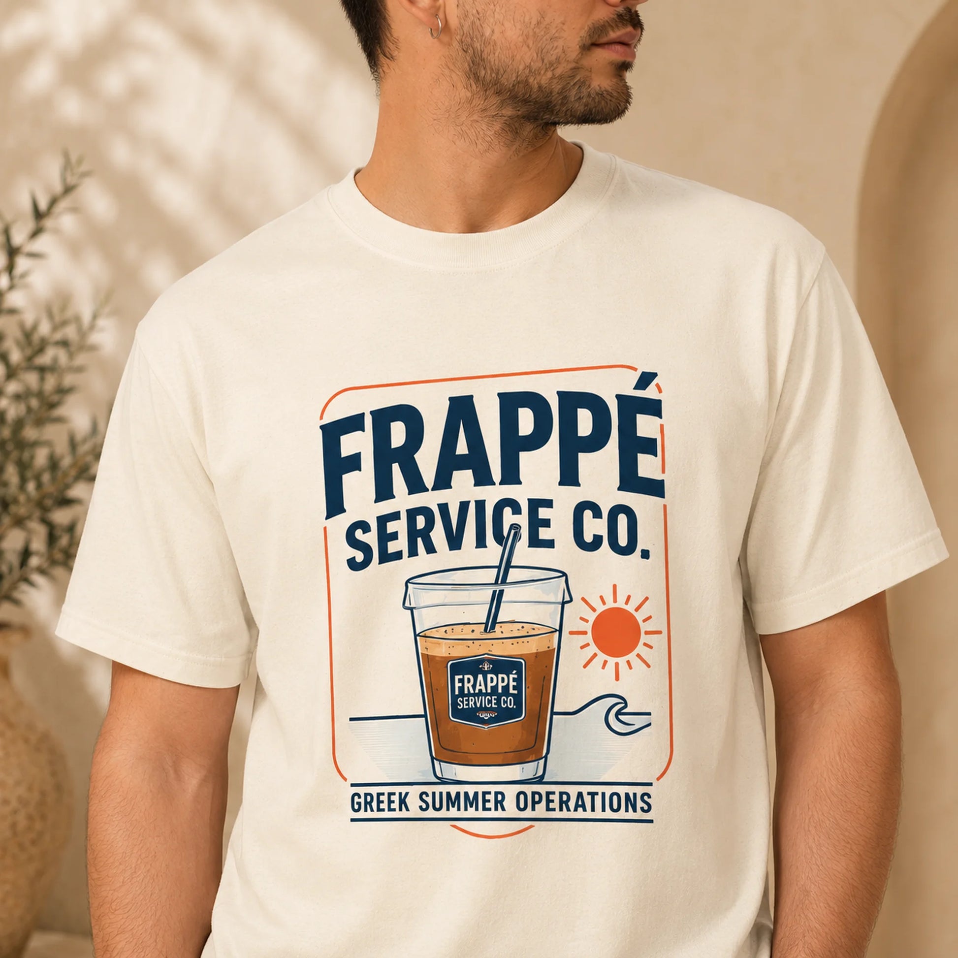 TP HERO: Person wearing a white t-shirt with 'Frappé Service Co.' graphic design.