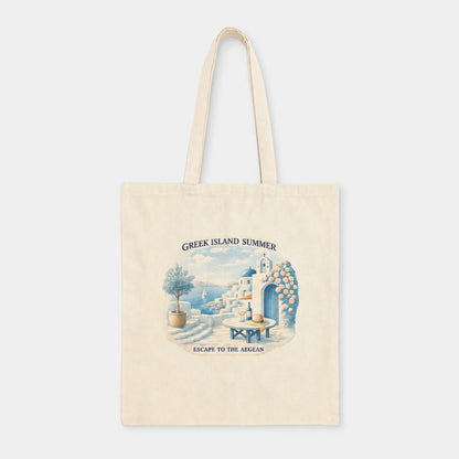 A cream-colored canvas tote bag with a vintage-style illustration of a Greek island summer scene, featuring the text 'GREEK ISLAND SUMMER' and 'ESCAPE TO THE AEGAN'.