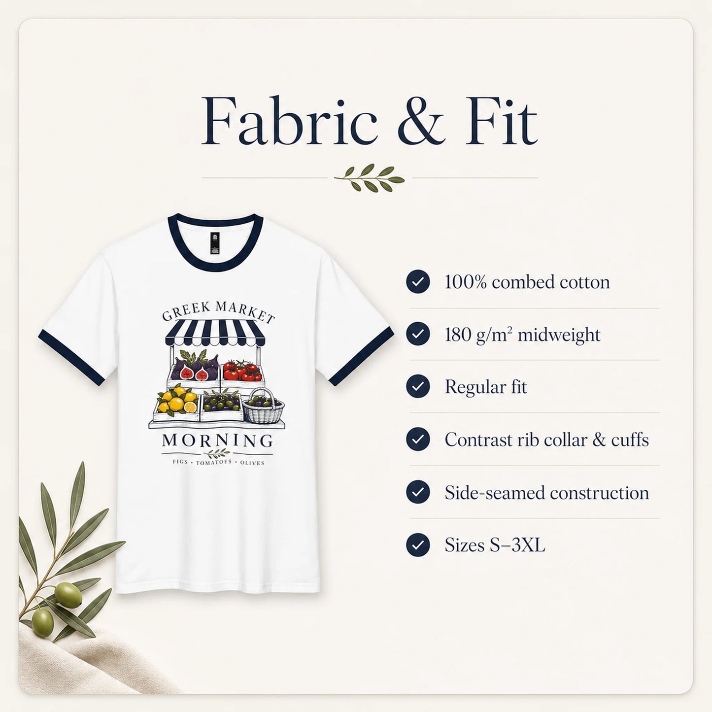 A white ringer T-shirt with navy blue trim and a colorful Greek market morning stand graphic on the front, shown on a cream background with text reading 'Fabric & Fit' and a list of fabric and fit details.