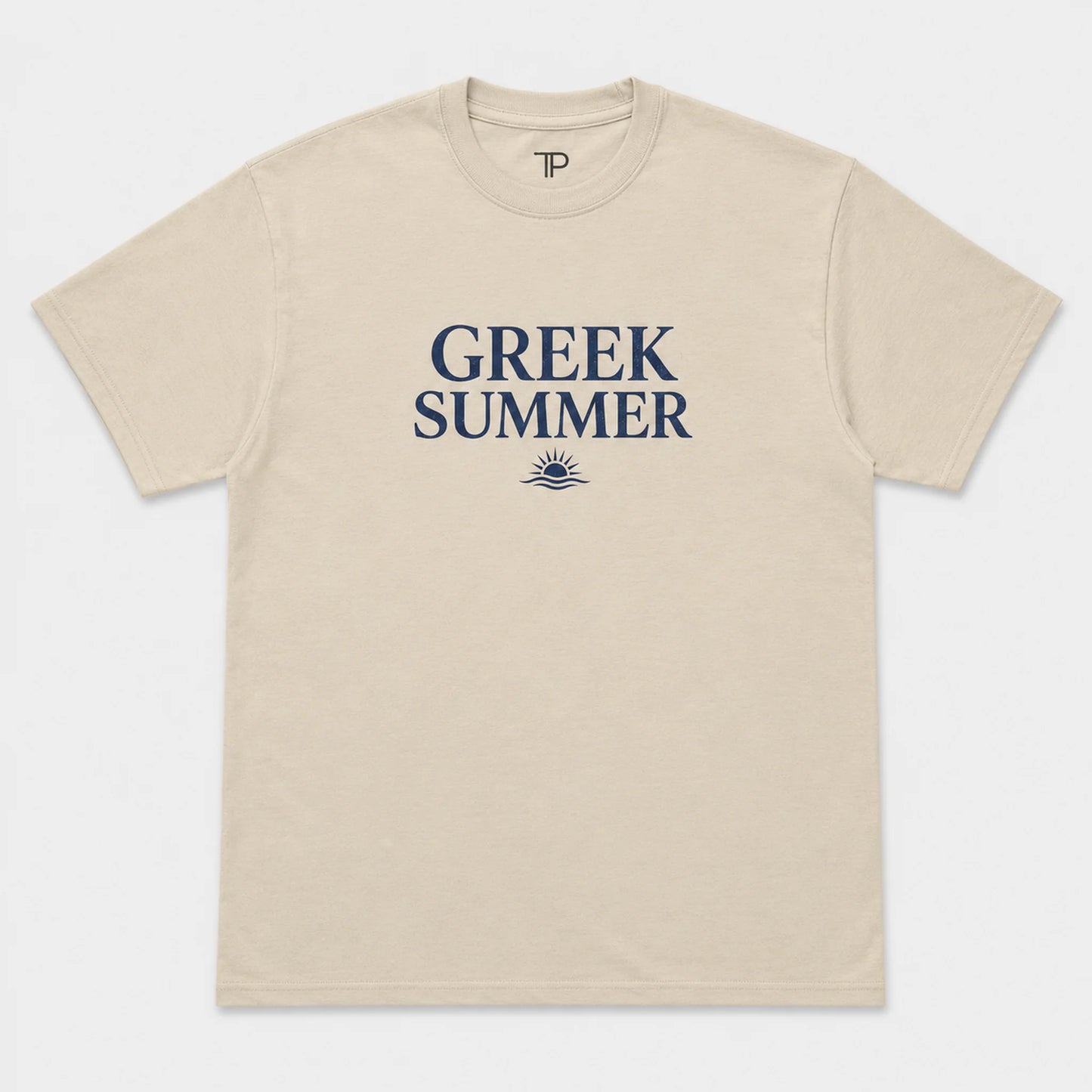 A beige crewneck t-shirt with 'GREEK SUMMER' printed in navy blue text and a small sun graphic on the chest, displayed flat against a light gray background.