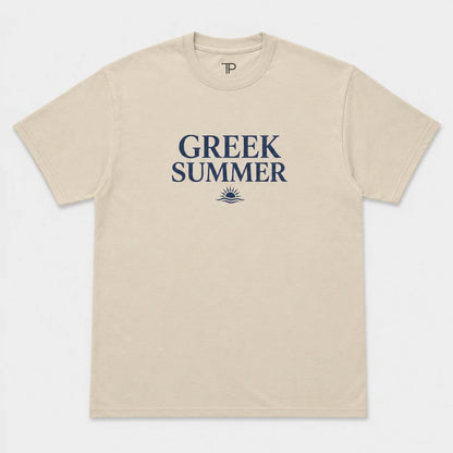 A beige crewneck t-shirt with 'GREEK SUMMER' printed in navy blue text and a small sun graphic on the chest, displayed flat against a light gray background.
