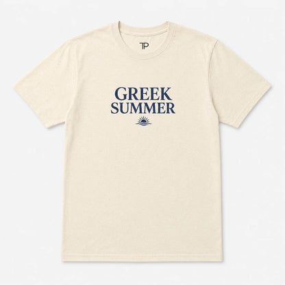 A cream-colored short-sleeve t-shirt with 'GREEK SUMMER' printed in navy blue on the chest, accompanied by a small sun graphic below. The inner collar features a small 'TP' logo.