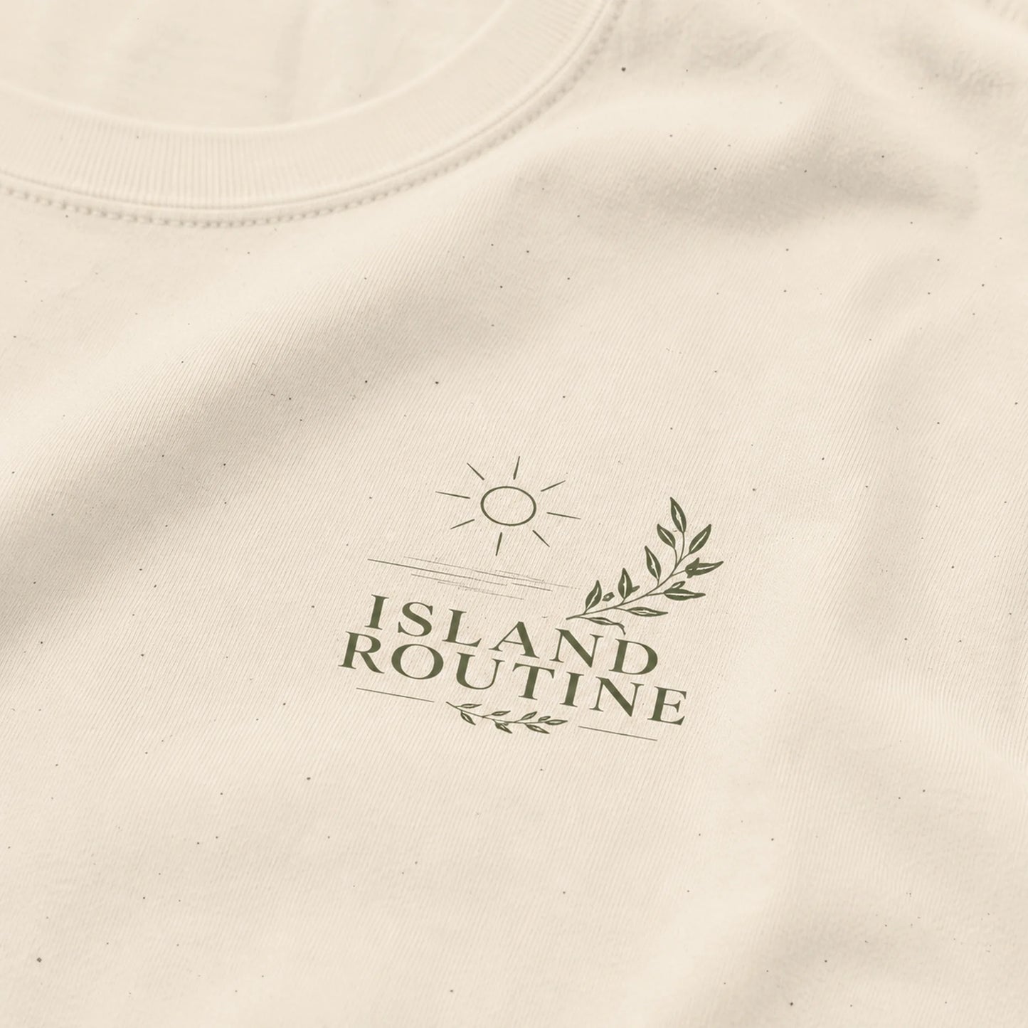 Beige fabric with 'Island Routine' logo printed on it