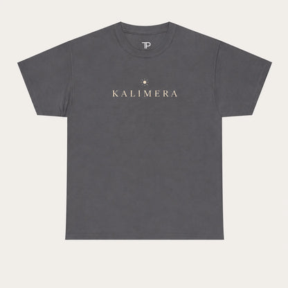 A charcoal crewneck t-shirt with 'KALIMERA' printed in beige across the chest, accompanied by a small star graphic, shown on a light beige background.