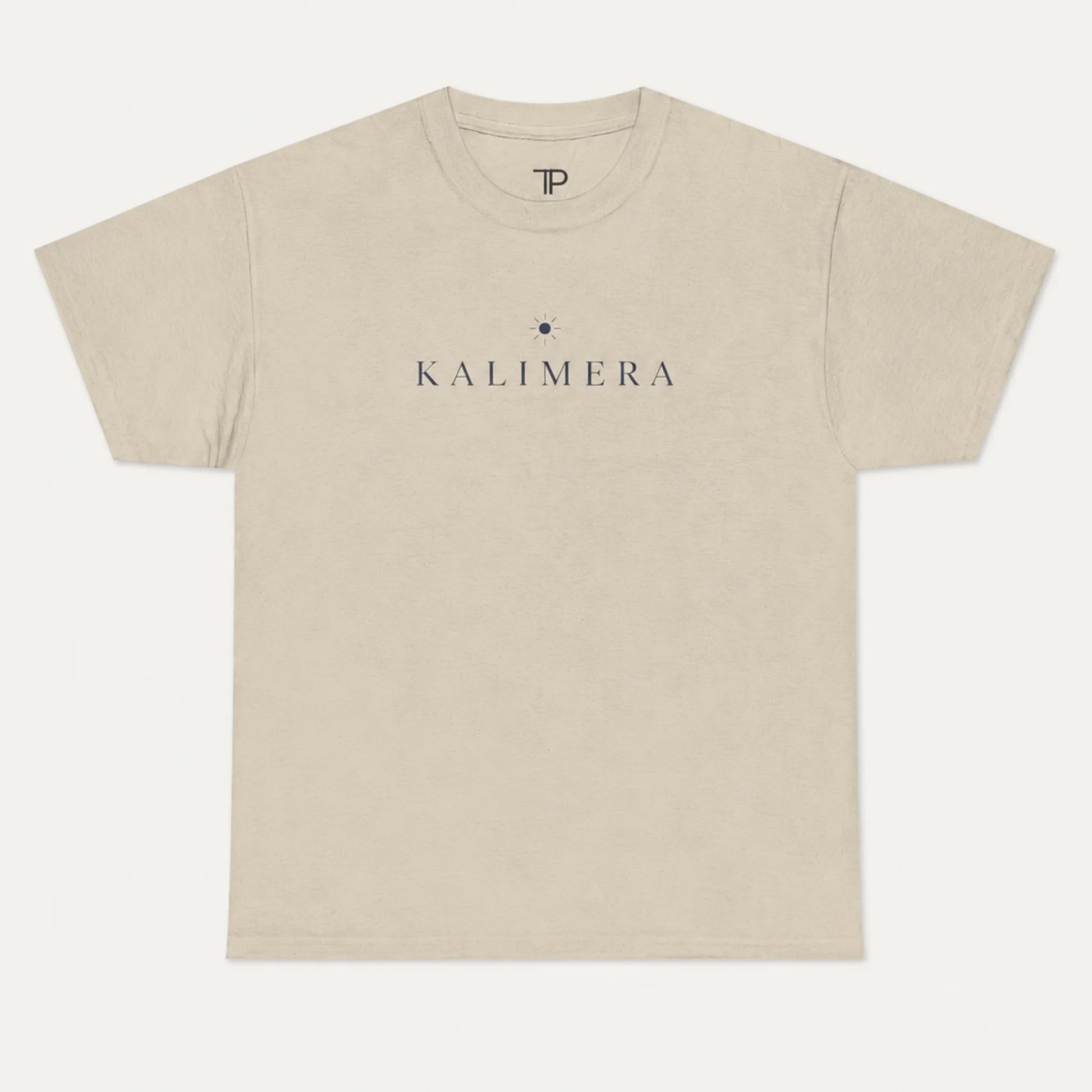 A sand crewneck t-shirt with 'KALIMERA' printed in dark gray across the chest, flanked by a small dark star logo, shown on a light gray background.