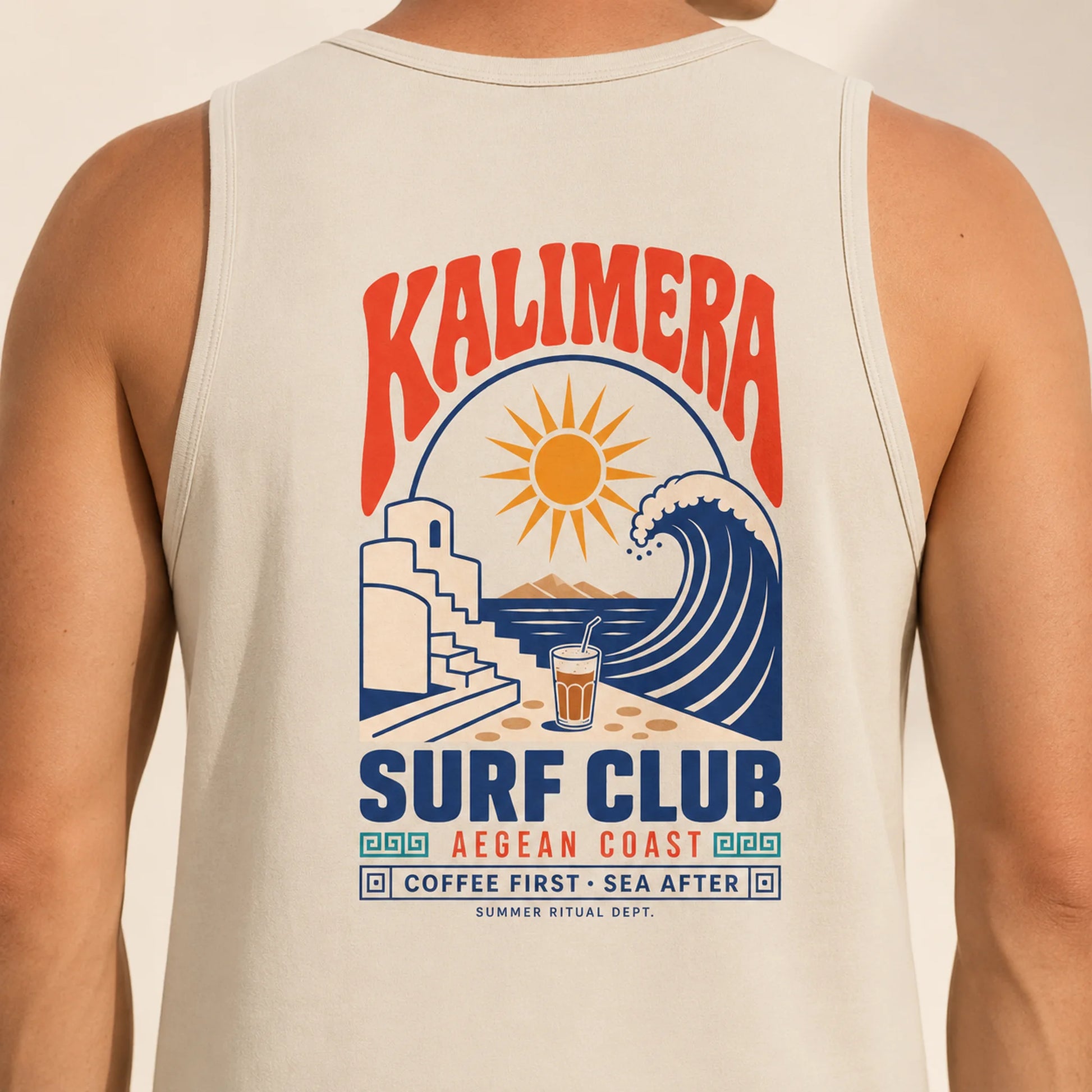 TP HERO: A man wearing a cream-colored tank top, showing the back of the garment with a large graphic print that reads 'KALIMERA SURF CLUB' in red and blue, featuring a sun, wave, and beach illustration.