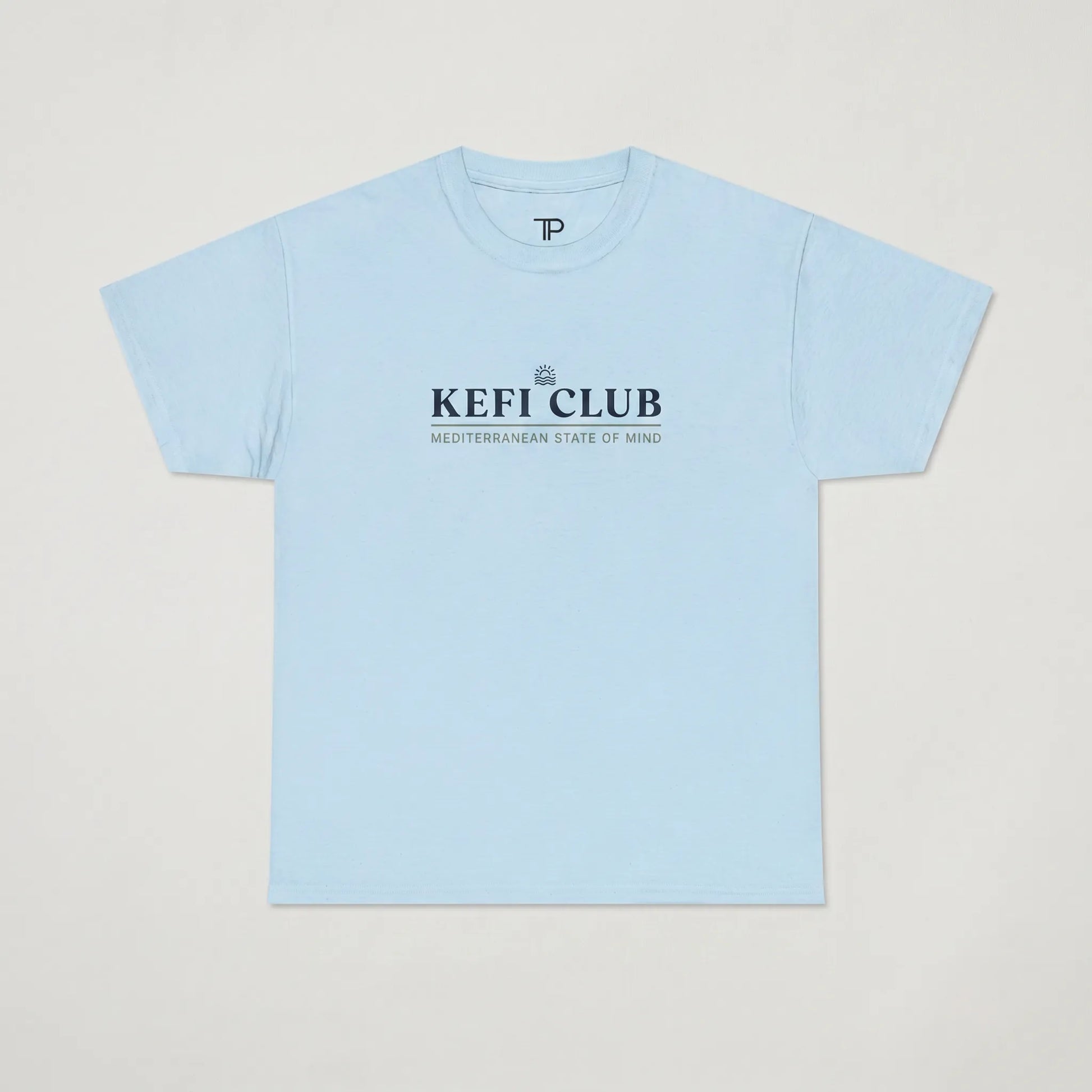 Light blue t-shirt with 'KEFI CLUB' text on a light gray background