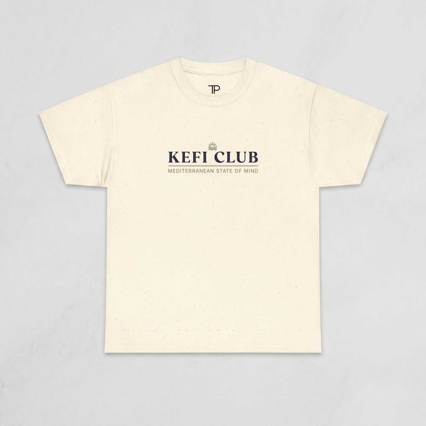 Beige t-shirt with 'KEFI CLUB' text on a light gray background