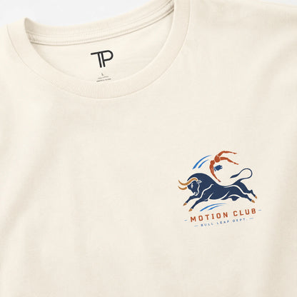 Beige t-shirt with 'Motion Club' logo featuring a bull and a person on a white background