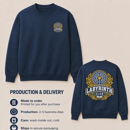 Navy blue crewneck sweatshirt shown from front and back on a beige background, with a small chest crest on the front and a large 'Labyrinth Club' graphic on the back. Text on the left lists production and delivery details.